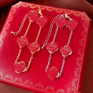 Bracelet cœur plaqué or 18 carats avec pendentif agate rouge en or et argent