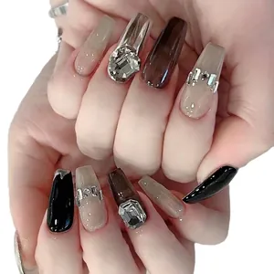 Handmade coffin press-on nails in black, silver mirror, and nude tones with luxury rhinestones