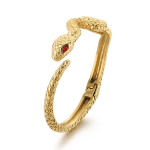 Vintage punk snake-shaped stainless steel cuff bracelet with red gem eyes and gold finish