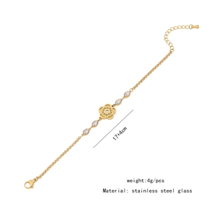 Detail showing gold stainless steel flower bracelet with crystals and 17+4cm length