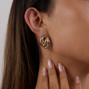 Minimalist two-tone C-shaped hoop earrings in 18K gold and silver stainless steel