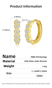 Detail view of heart-shaped S925 silver hoop earrings with pave-set cubic zirconia