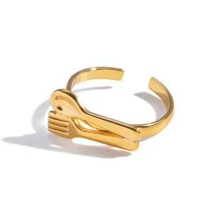 Unique gold spoon and fork wrap ring in polished stainless steel with adjustable open band