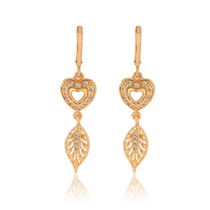 Detail of champagne gold hollow heart and leaf earrings with sparkling zircon inlay