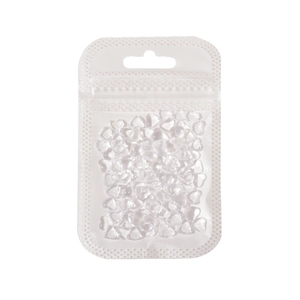 Bulk pack of clear 3D resin heart nail art charms in a transparent sealed bag