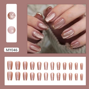 Faux ongles œil de chat avec bordure métallique et nœuds dorés, style ballerine