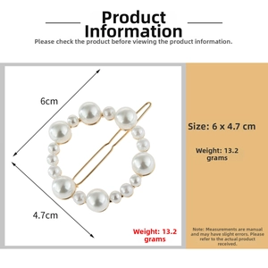Detail view of round pearl hair clip with gold metal base showing 6x4.7cm dimensions
