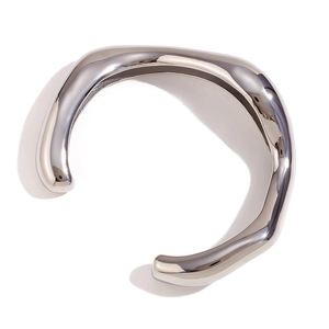 Irregular silver wave open bangle in minimalist stainless steel with polished finish