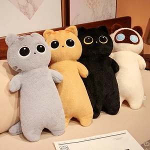 Cute long cat plush pillow collection in grey, orange, black and cream on a cozy sofa
