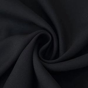 Elegant black lace patchwork evening dress with slim fit and refined fabric texture