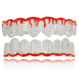 Iced out hip hop grillz set with red dripping oil flames and sparkling cubic zirconia