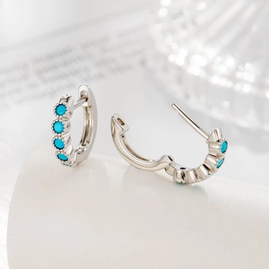 French vintage silver huggie earrings featuring four inlaid turquoise stones for women