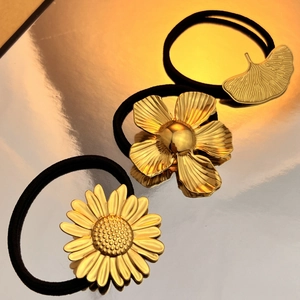 Elegant vintage sunflower hair ties with golden metal floral charms and black elastic bands
