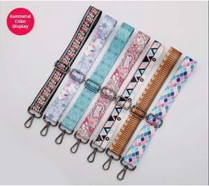 Detail of 38mm wide replacement bag straps with gunmetal hooks in diverse ethnic patterns