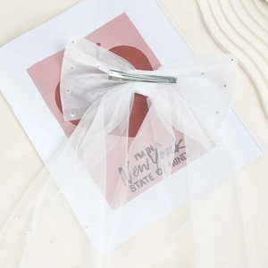 Elegant white mesh bow hair clip with pearls for wedding bridal hair styling accessories