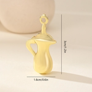 Detailed view of a golden teapot pendant with measurements 3cm by 1.6cm for DIY jewelry