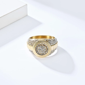 Macro shot of gold-plated hip hop ring with sparkling iced out pave diamonds