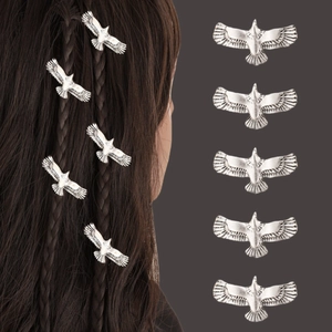 Silver eagle dreadlock rings showing hair styling use and detailed feather textures