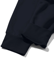 Detailed close-up of ribbed knit cuffs on heavy fleece-lined cargo sweatpants