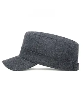Side view of dark gray wool flat top army cap with detailed weave texture on white background