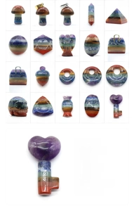 Detailed grid of diverse chakra gemstone carvings showing varied shapes and materials