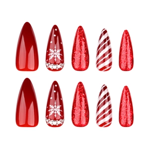 Unghie stiletto natalizie con glitter rossi, fiocchi di neve e strisce a bastoncino di zucchero