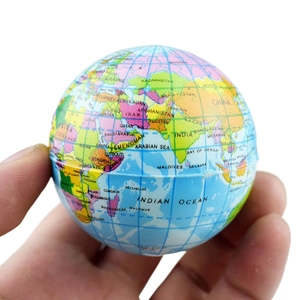 Detail of the foam earth stress ball showing the printed map texture and soft PU material