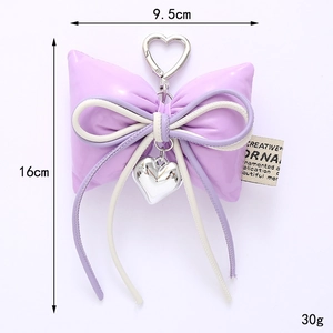 Purple leather bow keychain with heart clasp and woven cord, 16cm height accessory