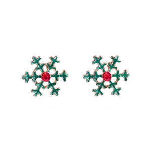 Detailed view of snowflake earrings with green enamel, gold base and red crystal center