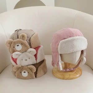 Winter plush bear earflap hat for kids featuring warm lamb wool lining and suede fabric