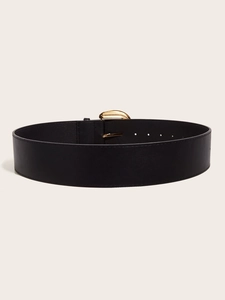 Detail of black wide leather belt with a polished gold semi-arched metal buckle
