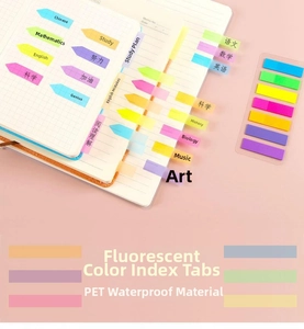 Close-up of waterproof PET sticky index tabs showing translucent arrow and strip shapes