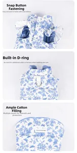 Detail of pet floral vest with snap closure and sturdy D-ring for leash attachment