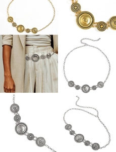 Detailed views of gold and silver vintage metal waist chains with crescent moon charms