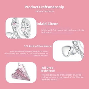 Close-up of S925 sterling silver pink heart charm with zircon and enamel details