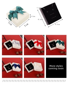 Detail showing 7x7x3.5cm square jewelry gift box dimensions and satin ribbon bow options