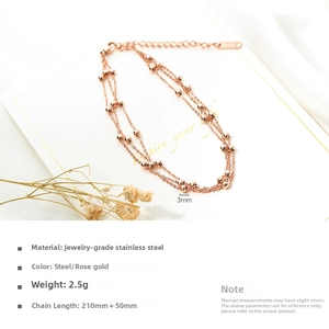 Detail of rose gold stainless steel multi-layer anklet with 3mm beads and extender chain