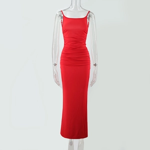 Detailed view of red ruched bodycon maxi dress with elegant slim fit side pleats