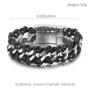 Detailed close-up of men's woven leather bracelet with polished stainless steel chain