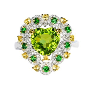 Exquisite silver ring with heart-shaped green peridot and micro-pave gemstone halo