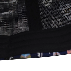 Close-up of breathable mesh material and colorful wing pattern on a baseball cap
