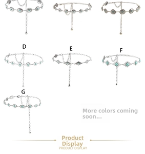 Detail of vintage bohemian silver waist chains with turquoise stones in multiple designs
