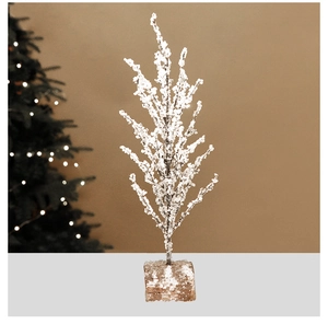Detail of white flocked artificial Christmas tree with snow effect on square base stand
