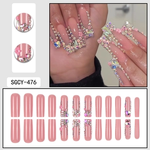 Pink long square press on nails with 3D flowers, rhinestones and luxury heart jewels