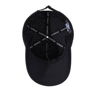Inside view of black breathable baseball cap with laser-cut ventilation and logo lining