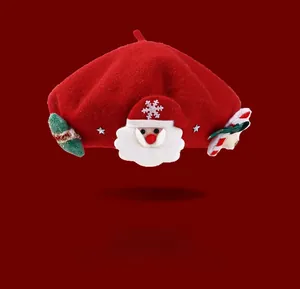Detail of red wool beret featuring 3D Santa Claus figure and festive glitter stars