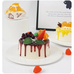 Detail of realistic purple glazed mousse cake model with berries and cream texture