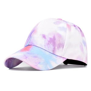Detailed side view of tie-dye baseball cap in pink purple and light blue cotton fabric