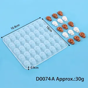 Silicone mold featuring 40-cavity skull shapes for DIY Halloween chocolate and baking