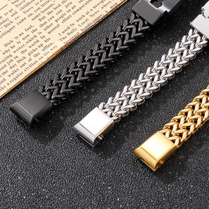 Detailed macro view of woven texture metal bracelets with square clasp in gold and silver